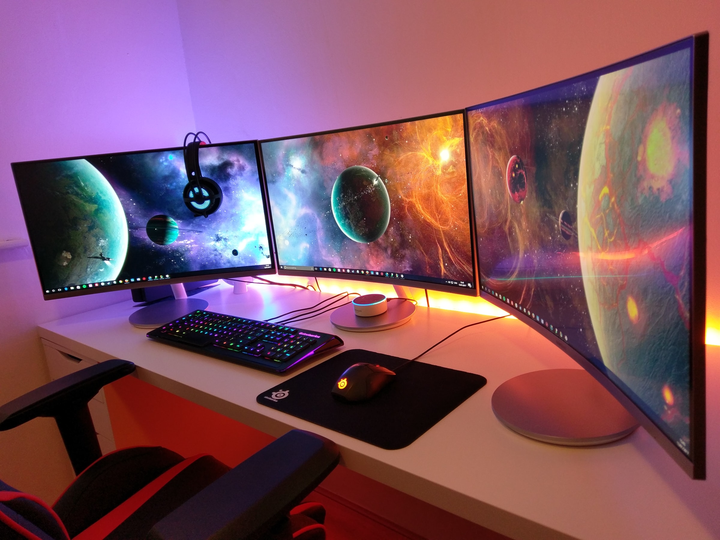 gaming rig with three HD monitors